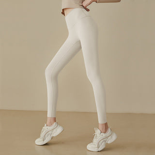 Leggings taille haute blancs cassé, coupe moulante, tissu lisse