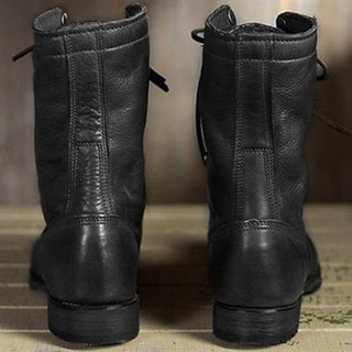 Bottes mi-mollet en cuir noir à lacets, vue arrière avec bride et semelle épaisse