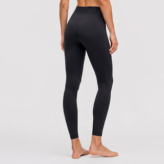 Leggings de yoga taille haute noir, jambe ajustée, taille élastique.