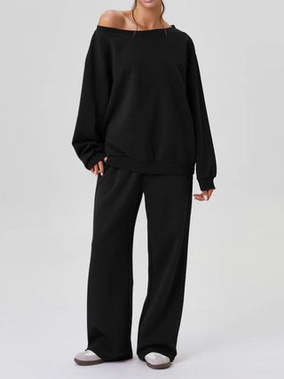 Ensemble détente noir pour femme : sweatshirt off-shoulder et pantalon large en molleton