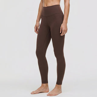 Leggings de yoga taille haute marron, jambe longue moulante.