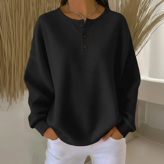Sweat-shirt femme en tricot gaufré noir, encolure boutonnée à trois boutons