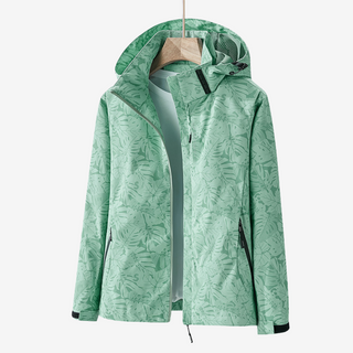 Veste coupe-vent imperméable à capuche, vert à imprimé feuilles, fermeture zippée.