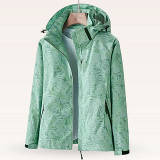 Veste de rafraîchissement verte à capuche, fermeture zippée, motif feuillagé.