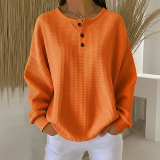 Sweat-shirt femme en tricot gaufré orange, manches longues et patte boutonnée