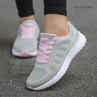 Chaussures décontractées orthopédiques Ora™ gris clair à lacets roses, semelle blanche.
