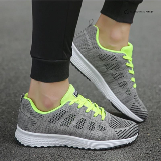 Chaussures décontractées orthopédiques Ora™ gris à lacets vert fluo, semelle blanche.