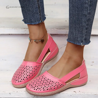 Chaussures orthopédiques femme roses à perforations, semelle beige