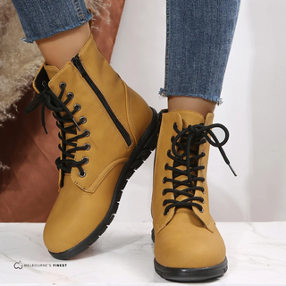 Bottes d’hiver jaunes montantes à lacets et fermeture éclair latérale