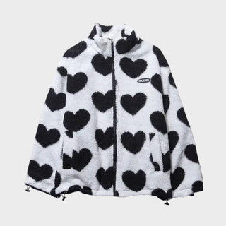 Veste réversible Manuela en polaire blanche à cœurs noirs, capuche doublée, zip