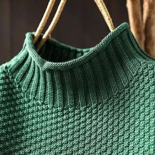 Pull en cachemire Amara vert, col montant côtelé et maille en texture serrée