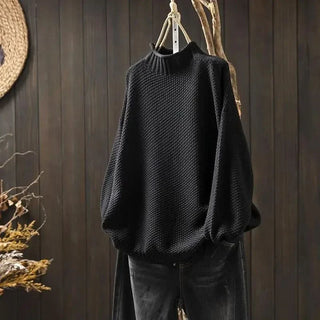 Pull en cachemire Amara noir, col montant côtelé et maille texturée à relief