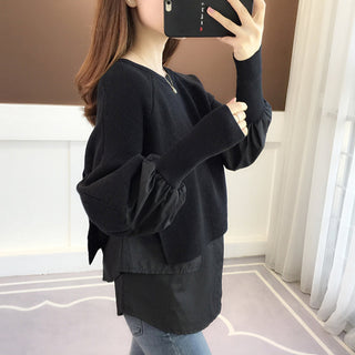 Pull noir ample en maille, manches bouffantes et bas superposé volanté