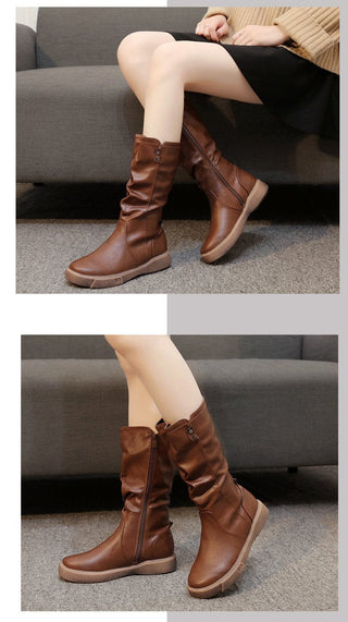 Bottes mi-mollet marron, fermeture éclair latérale, tige arrondie.