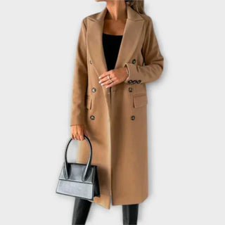 Manteau long en laine kaki, col à revers, double boutonnage décoratif.