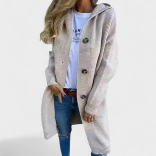 Manteau long beige clair à col châle, fermeture boutonnée, manches longues