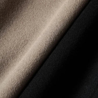 Tissu de manteau en laine, texture fine, beige et noir (gros plan)