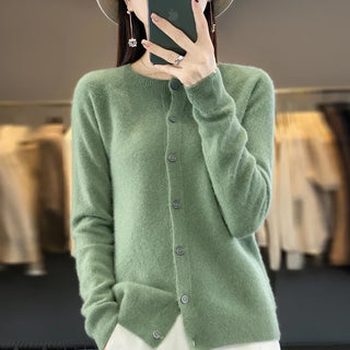 Cardigan en tricot à boutons vert, encolure ronde, boutons sur la patte