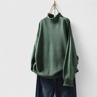 Pull femme col montant texturé vert foncé, coupe ample et manches chauve-souris
