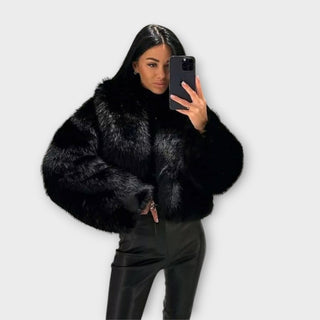 Veste Margarida en cuir fourré noir à manches longues, col en fourrure, fermeture