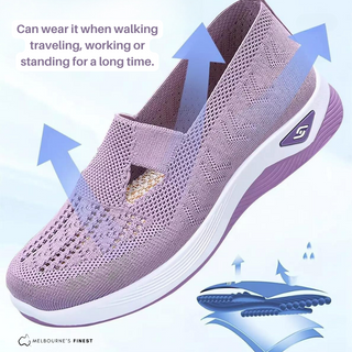 Chaussure orthopédique en maille ajourée violette, semelle blanche et talon texturé.