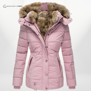 Manteau d'hiver matelassé rose pâle à capuche bordée de fausse fourrure