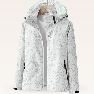 Veste de rafraîchissement blanche à capuche, fermeture zippée, motif feuillagé.