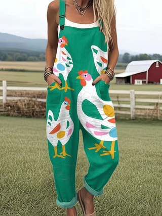Salopette verte à bretelles avec motifs d’oiseaux multicolores, poches