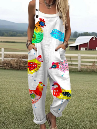 Salopette blanche à bretelles, motifs d’animaux de la ferme multicolores.