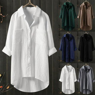 Chemise longue sur cintres, plusieurs coloris : blanc, vert, beige, bleu, noir.
