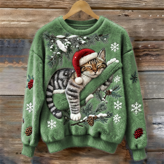 Pull femme vert à motif chat festif: flocons, branches de sapin et gants