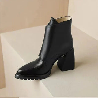 Bottines noires à talon bloc pour femme, tige haute lisse et semelle crantée
