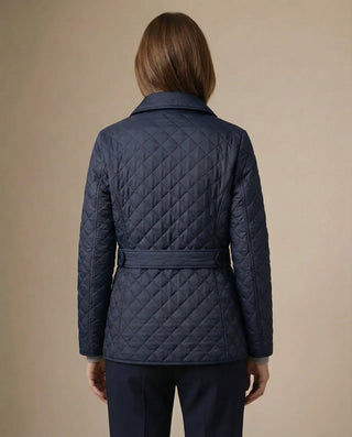 Veste matelassée boutonnée bleu marine, vue de dos avec ceinture à nouer