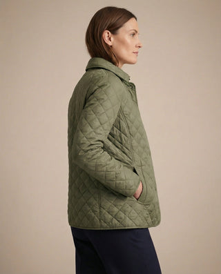 Veste boutonnée matelassée olive à col montant, manches longues, surpiqûres chevron