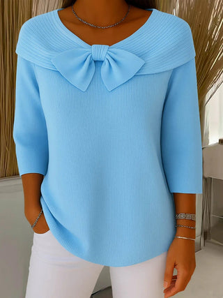 Pull femme bleu ciel à col rond avec nœud et manches trois-quarts côtelées
