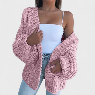 Veste en maille épaisse rose à manches longues, fermeture ouverte, maille texturée