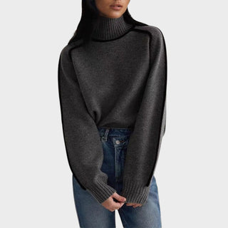 Pull en maille gris foncé à col montant côtelé, poignets côtelés, coupe ample