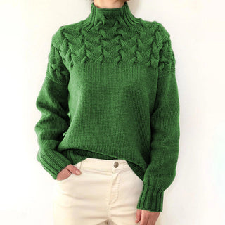 Pull en tricot à col roulé vert, manches longues, motif torsadé sur l’avant