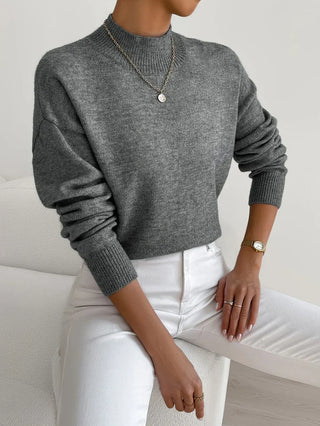 Pull femme col rond gris foncé, manches longues, poignets côtelés
