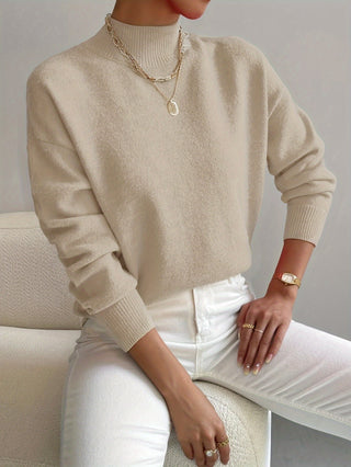 Pull femme col rond beige, manches longues, poignets côtelés