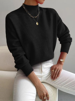 Pull femme col rond noir, manches longues, poignets côtelés