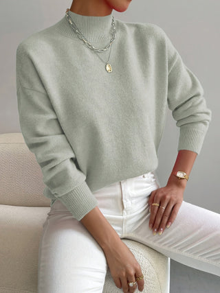 Pull femme col rond vert clair, manches longues, poignets côtelés