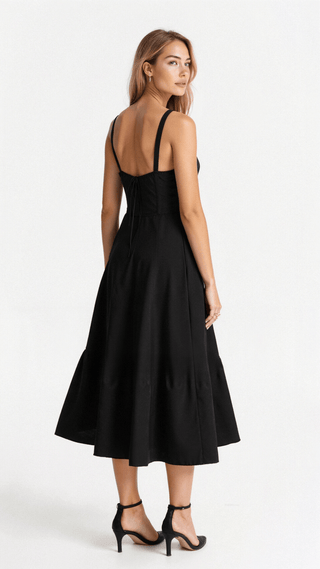 Détail corsage structuré taille cintrée robe midi élégante