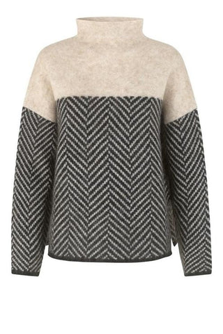 Blouse en maille à col montant, haut beige chiné et bas noir à motif chevrons