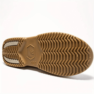 Semelle extérieure crantée de botte, motif chevrons, couleur caramel.