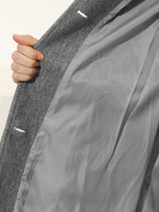 Trench Aveline gris, intérieur clair avec doublure lisse, col et patte ouverts