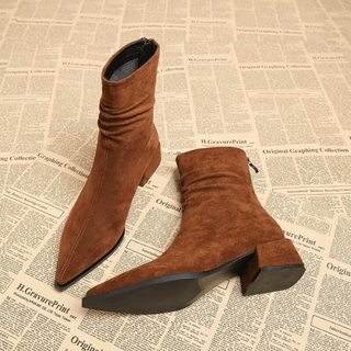 Bottes femme marron bout pointu avec talon bloc, vue de dessous et côté