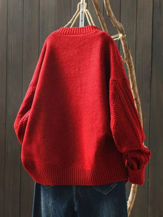 Cardigan en tricot rouge, vue dos, manches ballon et côtes au bas