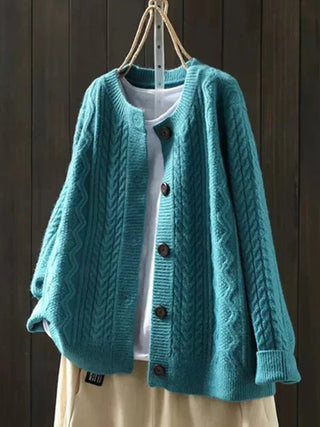 Cardigan en tricot bleu turquoise à gros maillons, boutons sur le devant