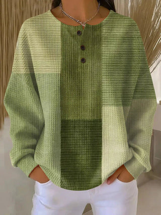Pull henley en tricot waffle, blocs vert, manches longues boutonnées